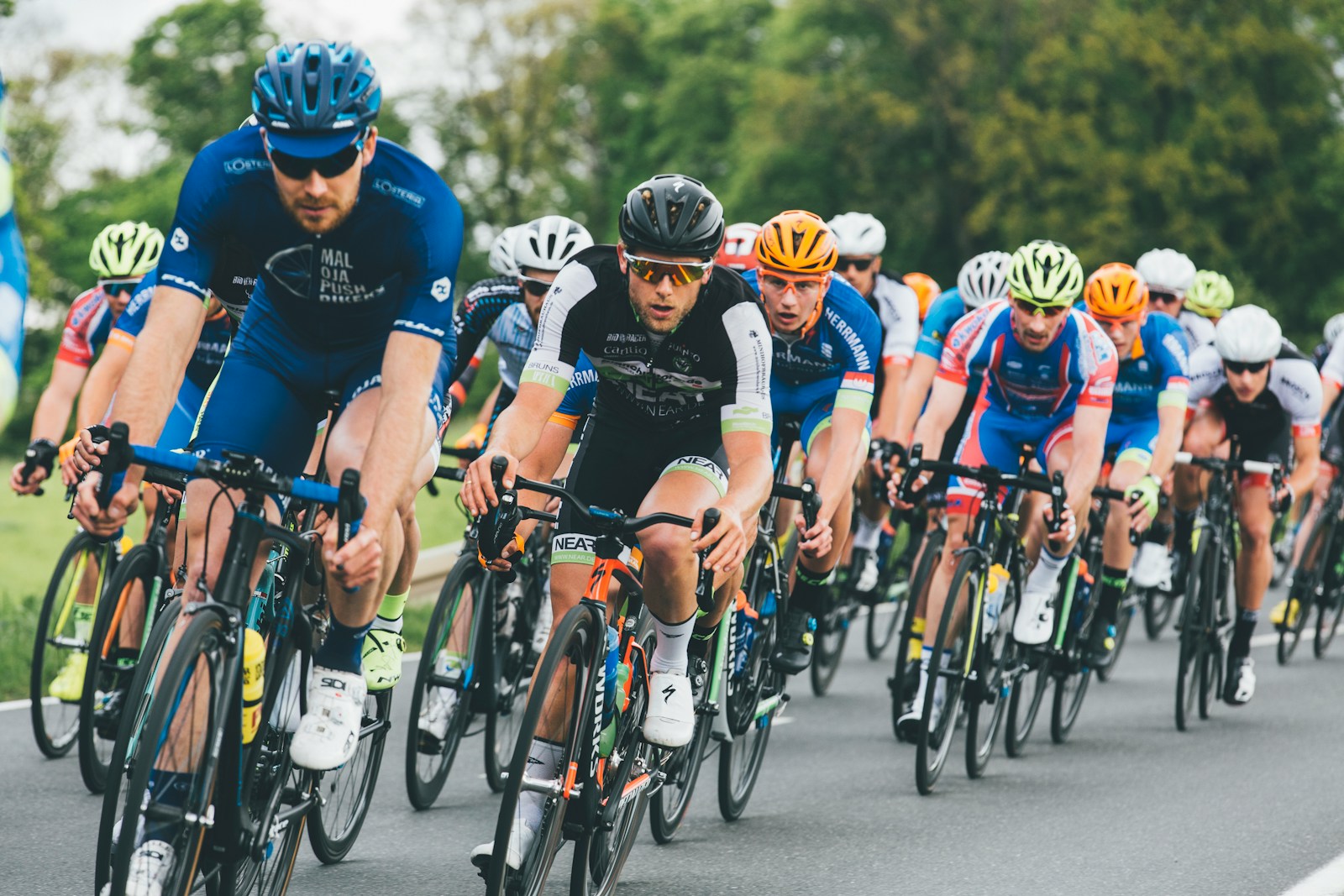 Professional cycling peloton in close competition